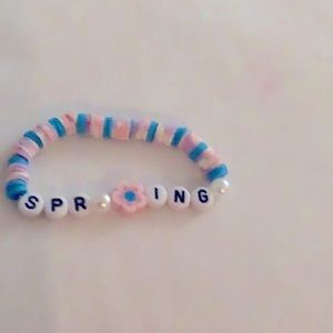 Spring clay bead bracelet pink blue and purple color whit cute flower charm